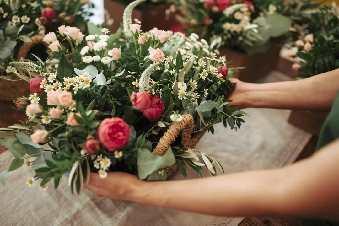 A breathtaking bridal bouquet crafted with white roses and delicate greenery.
